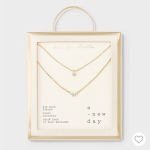 14k gold plated triple cubic zirconia layered necklace. A new day Gold.